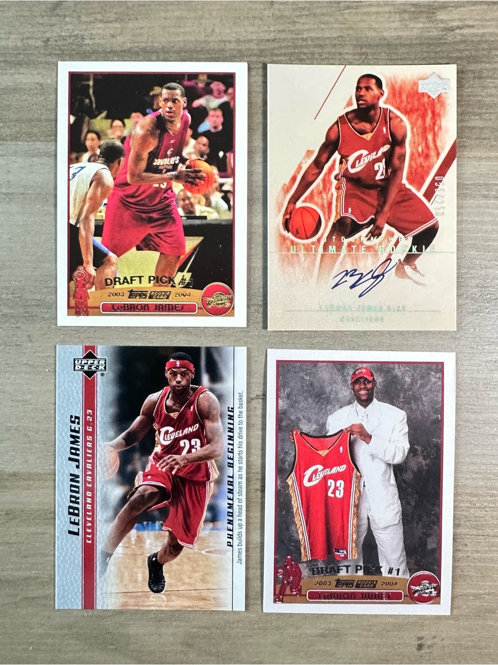 LeBron James Signed Rookie Lot of (4) Topps Upper Deck Novelty Cards.
